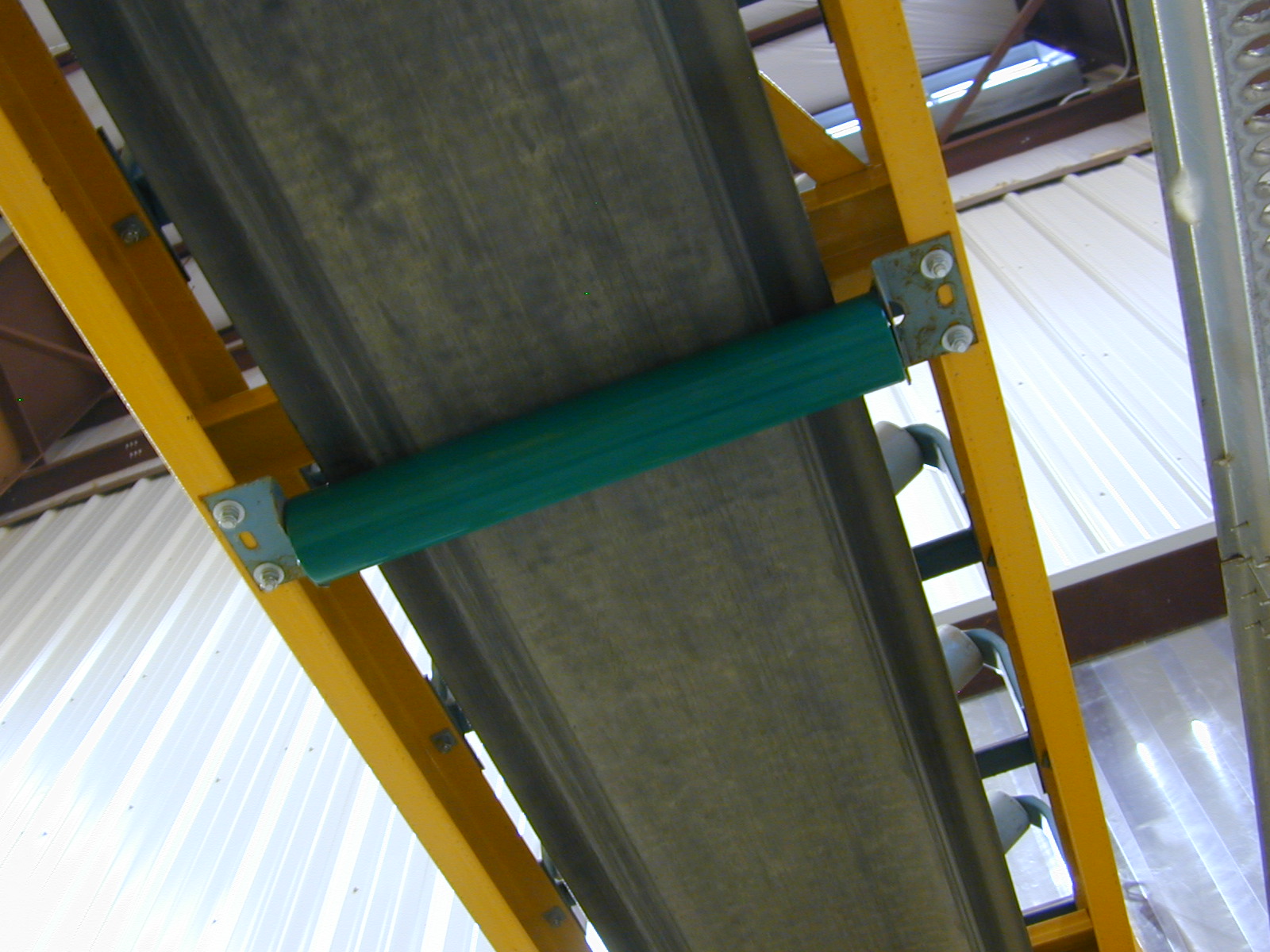 Conveyor after complete primer and polyurea barrier system