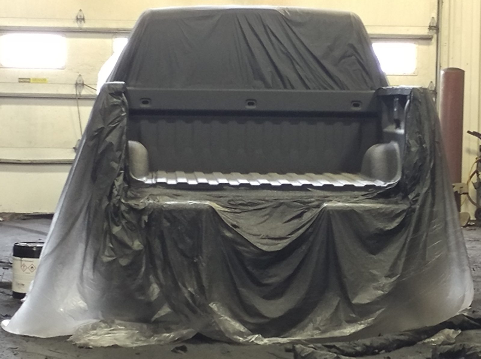 Applying the CorroShield membrane stage over primed steel